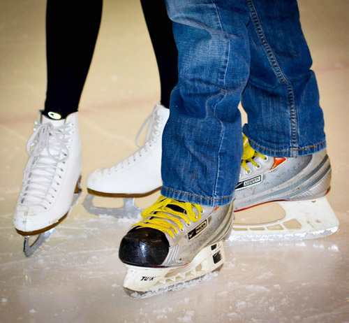 People wearing figure skates and ice hockey skates.