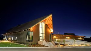 Exterior nighttime view of Foothills Golf Course clubhouse.