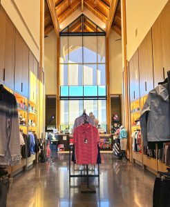 Pro shop with floor to ceiling windows at Foothills Golf Course clubhouse.